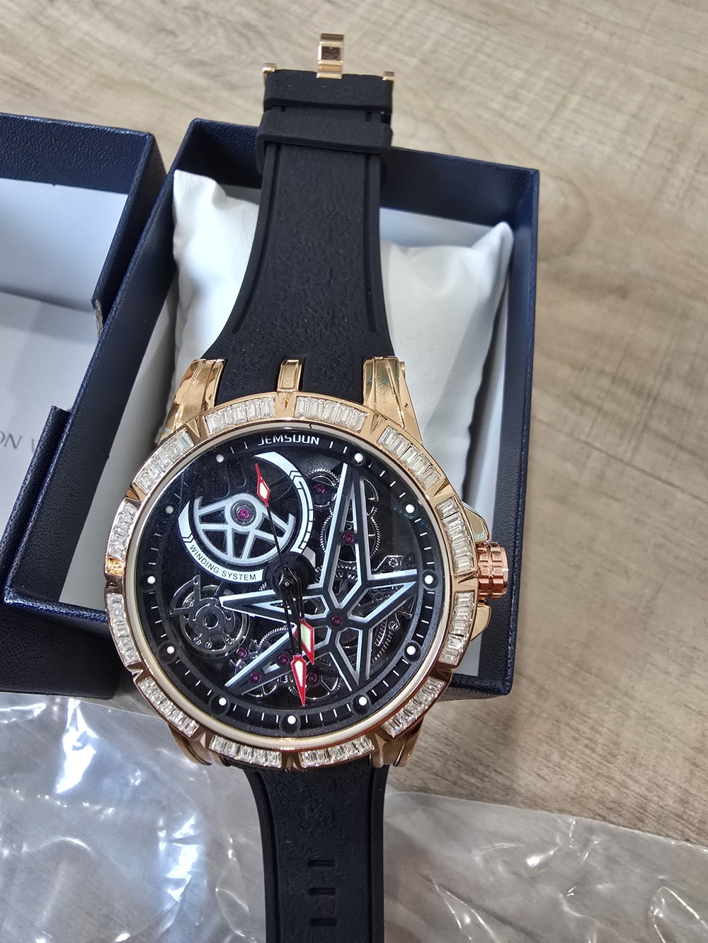 Men’s Rose Gold Skeleton Dial Watch with Black Strap